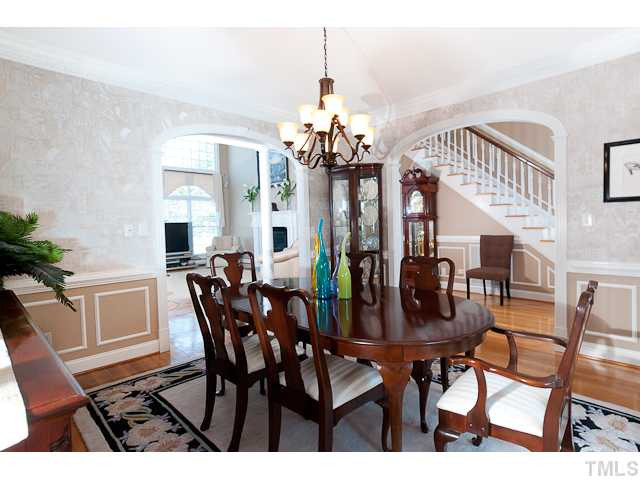 502 Mason Road Durham, NC 27712 - Photo 7 of 25 a view of a dining room with furniture and wooden floor
