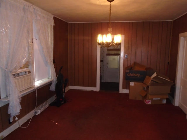 1012 North 8th Street Rochelle, IL 61068 - Photo 4 of 9 a view of a room with furniture and a window