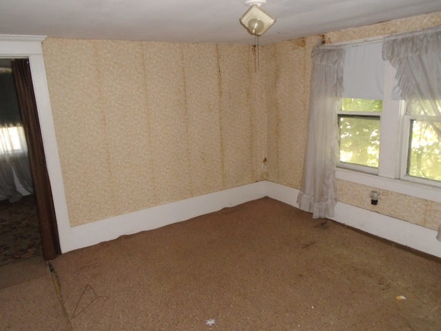 1012 North 8th Street Rochelle, IL 61068 - Photo 8 of 9 a view of an empty room with a window
