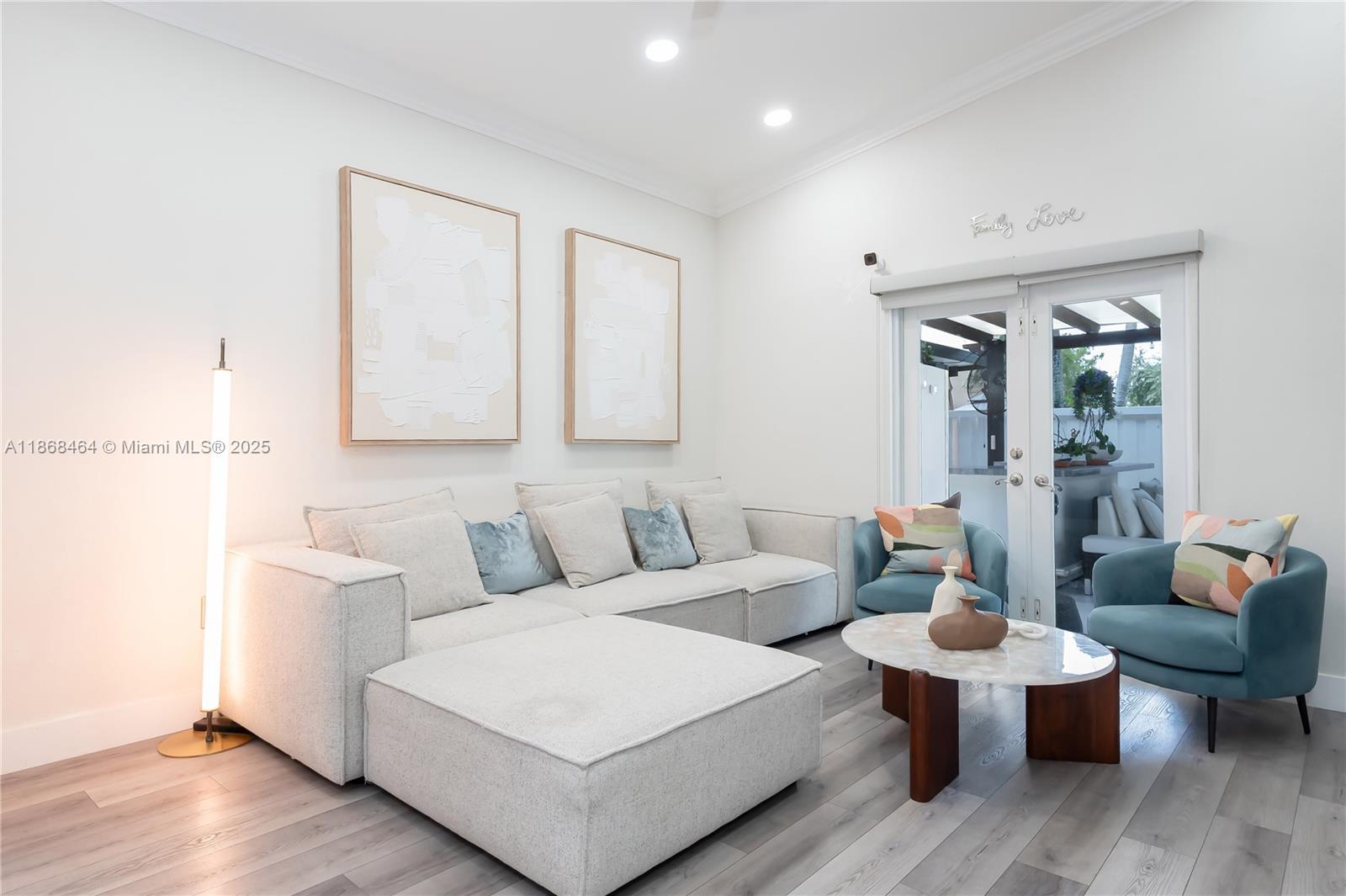 13348 Southwest 52nd Street Miramar, FL 33027 - Photo 15 of 48 a living room with furniture a rug and a lamp