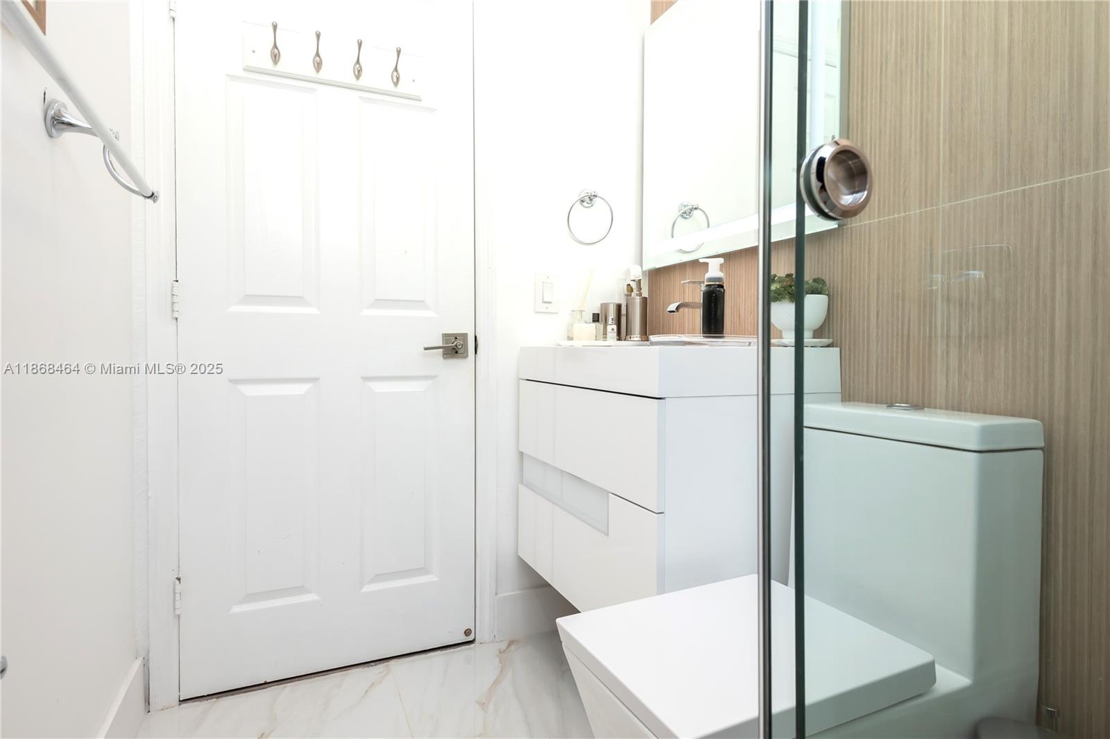 13348 Southwest 52nd Street Miramar, FL 33027 - Photo 24 of 48 a bathroom with a shower