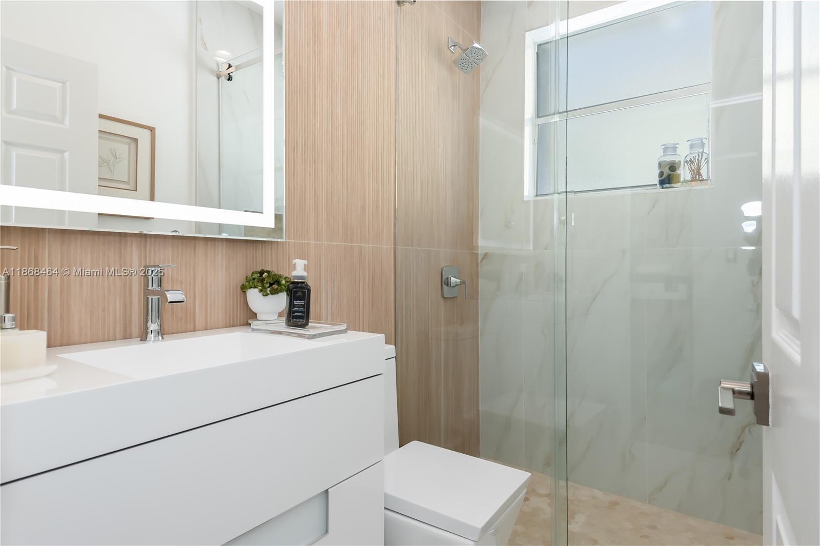 13348 Southwest 52nd Street Miramar, FL 33027 - Photo 25 of 48 a utility room with dryer and washer