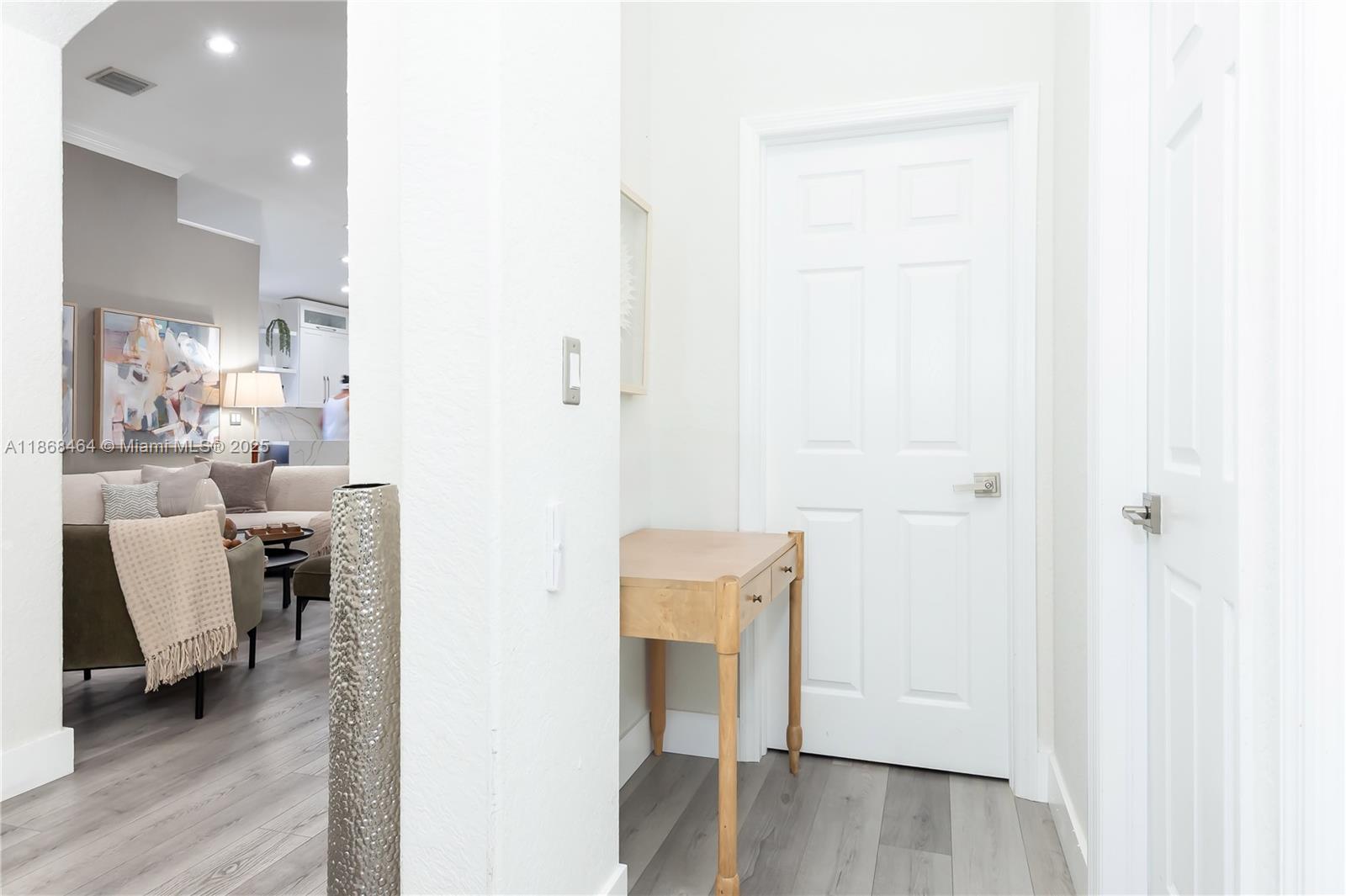 13348 Southwest 52nd Street Miramar, FL 33027 - Photo 26 of 48 a view of living room with furniture and wooden floor