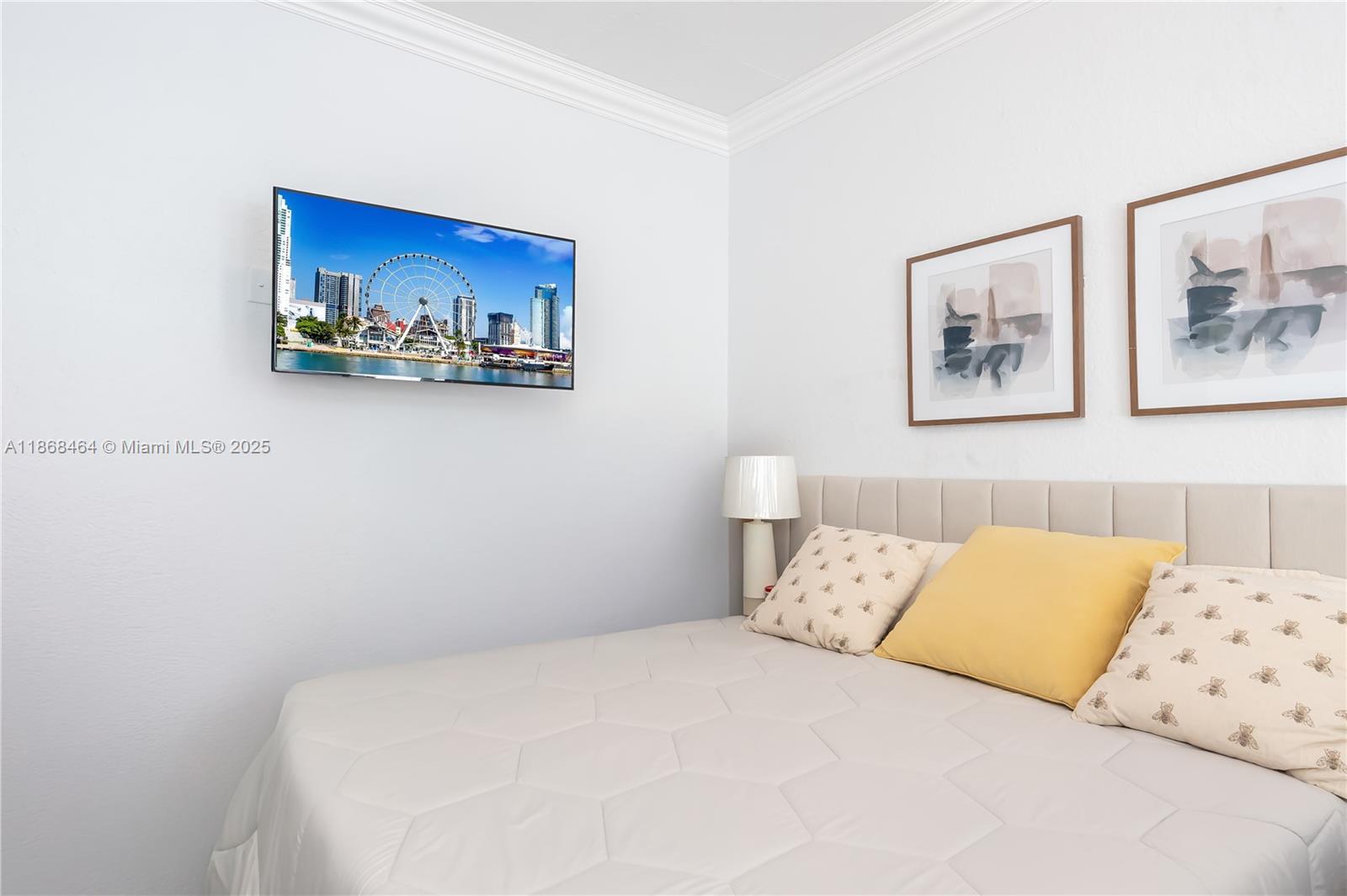 13348 Southwest 52nd Street Miramar, FL 33027 - Photo 27 of 48 a bedroom with a bed and painting on the wall