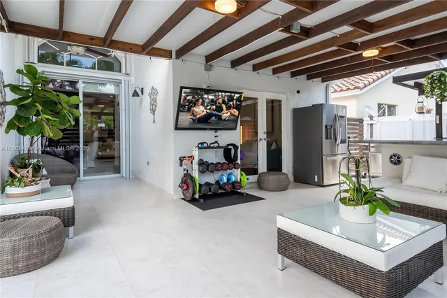 a living room with furniture and a couch