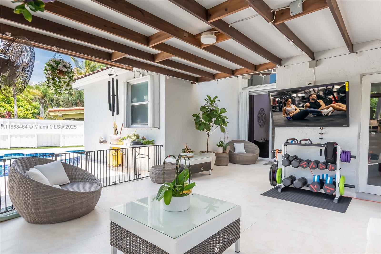 13348 Southwest 52nd Street Miramar, FL 33027 - Photo 37 of 48 a living room with furniture and a couch