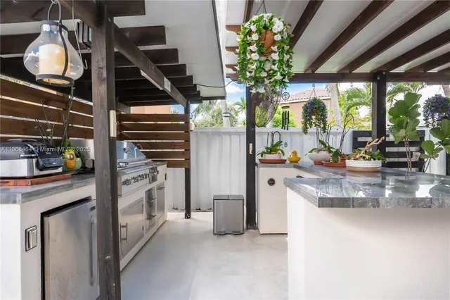 an aerial view of multiple houses with yard