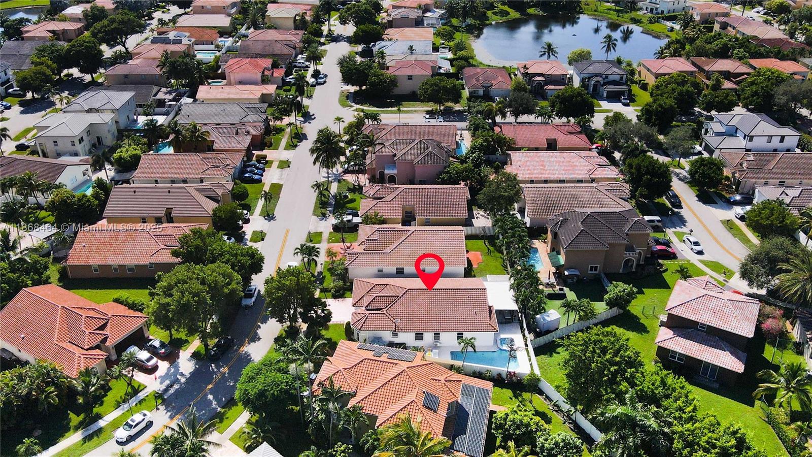13348 Southwest 52nd Street Miramar, FL 33027 - Photo 43 of 48 an aerial view of residential houses with outdoor space