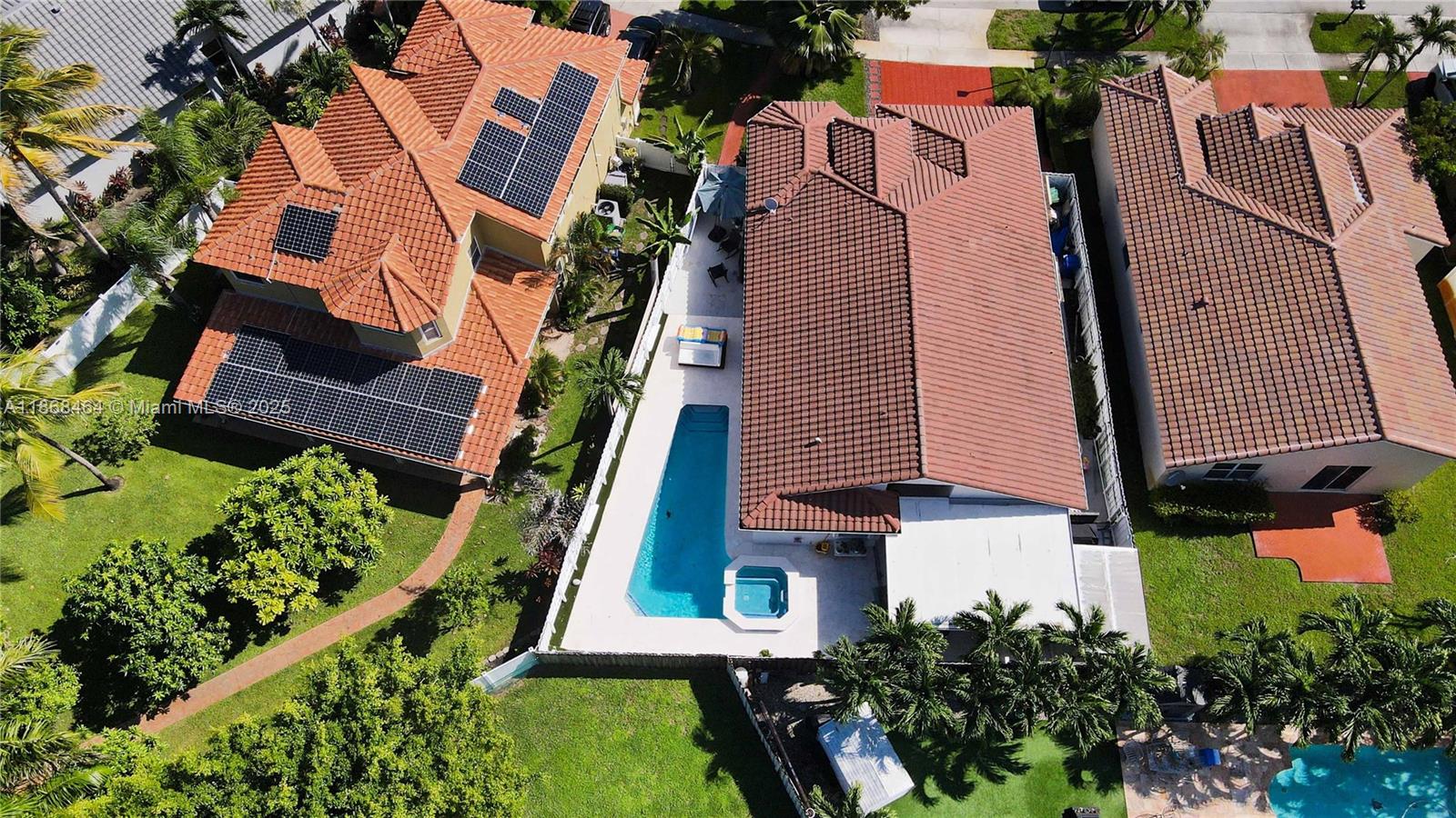 13348 Southwest 52nd Street Miramar, FL 33027 - Photo 46 of 48 an aerial view of residential houses with outdoor space