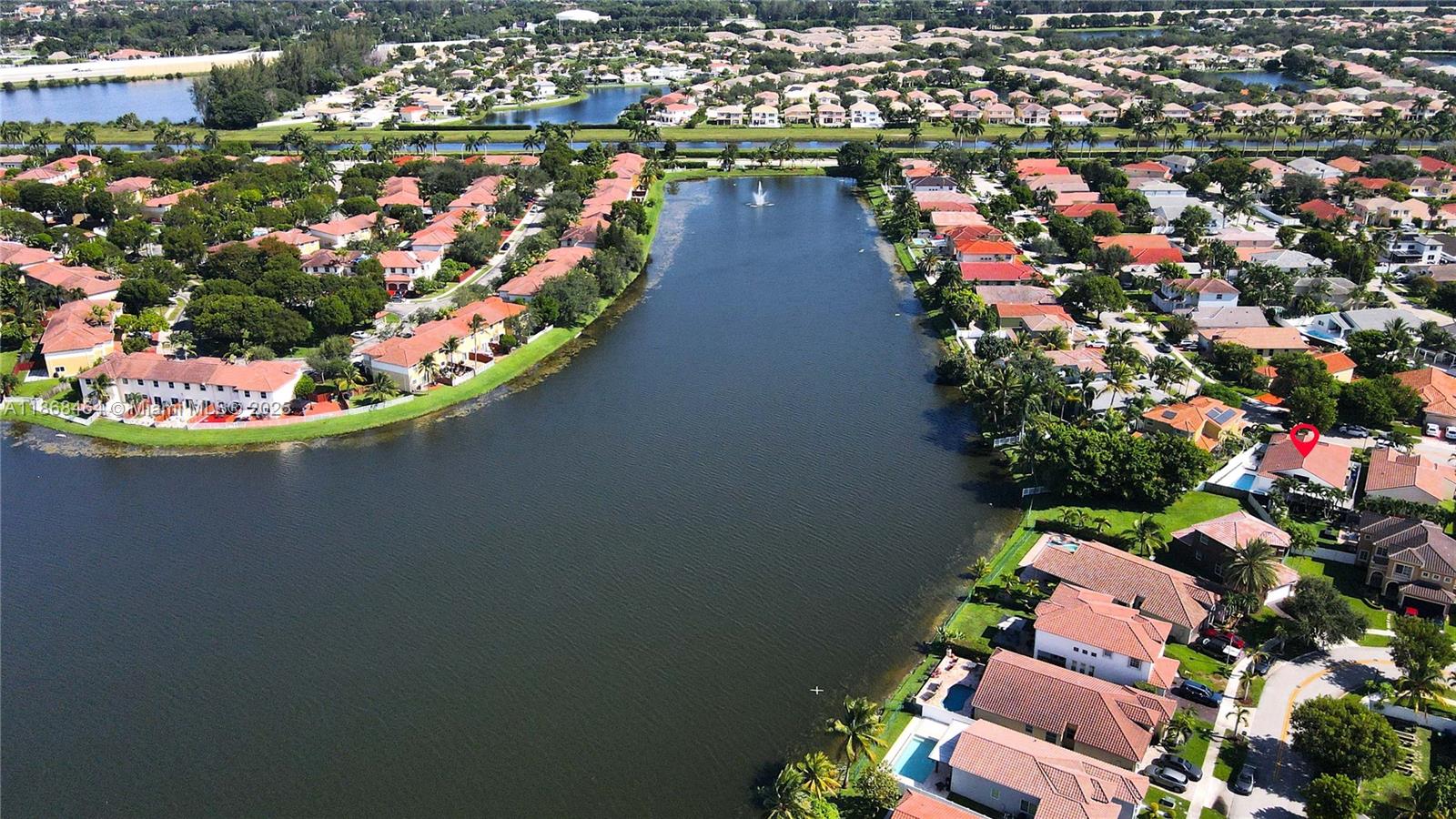 13348 Southwest 52nd Street Miramar, FL 33027 - Photo 48 of 48 an aerial view of a house with a garden and lake view