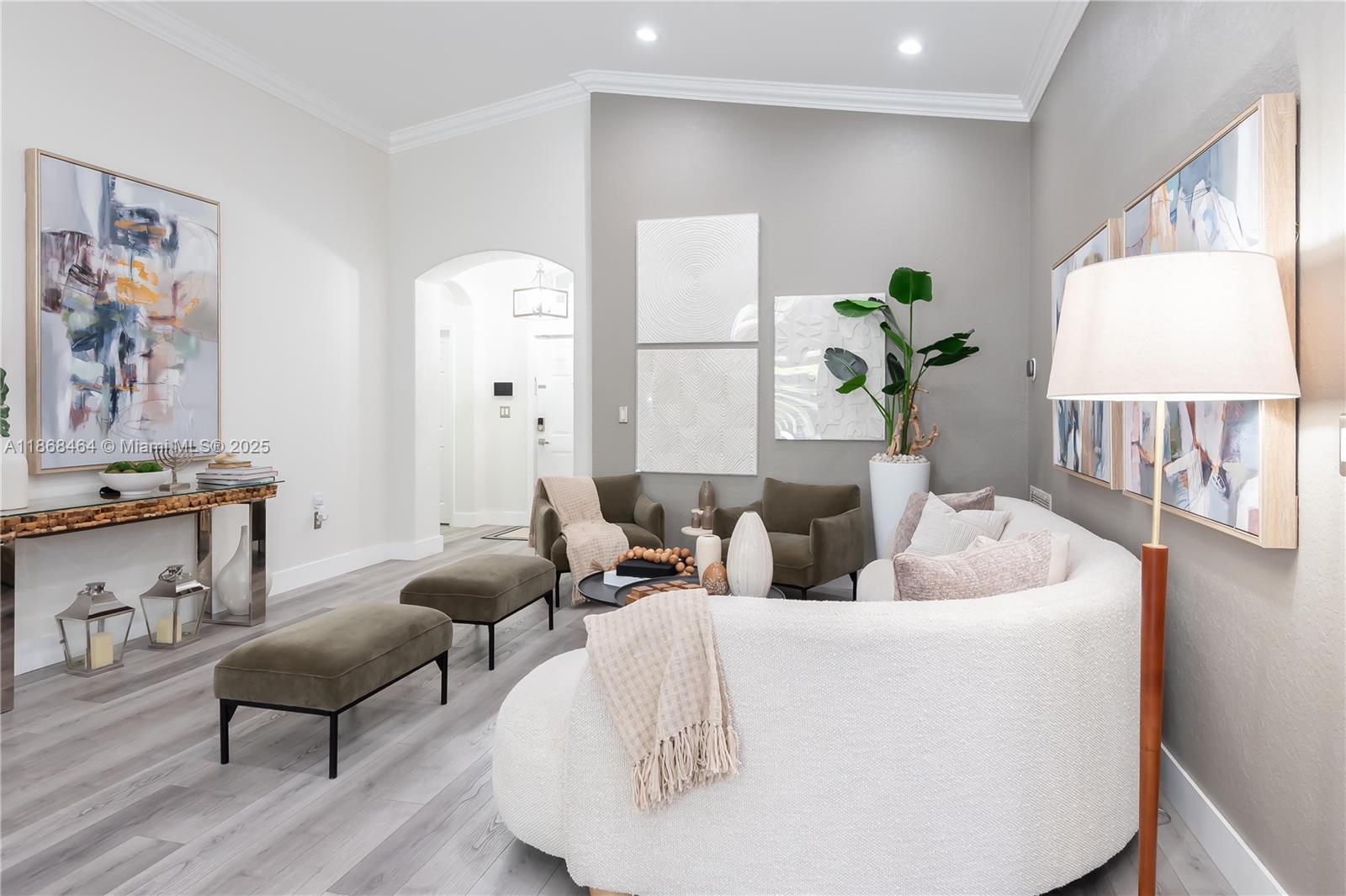 13348 Southwest 52nd Street Miramar, FL 33027 - Photo 9 of 48 a living room with furniture and a large window