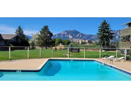 a view of a house with swimming pool