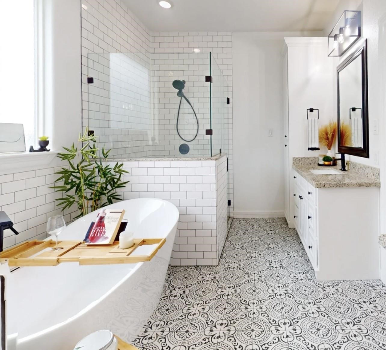 1508 North Blue Bonnet Lane Angleton, TX 77515 - Photo 7 of 11 a bathroom with a tub sink and mirror