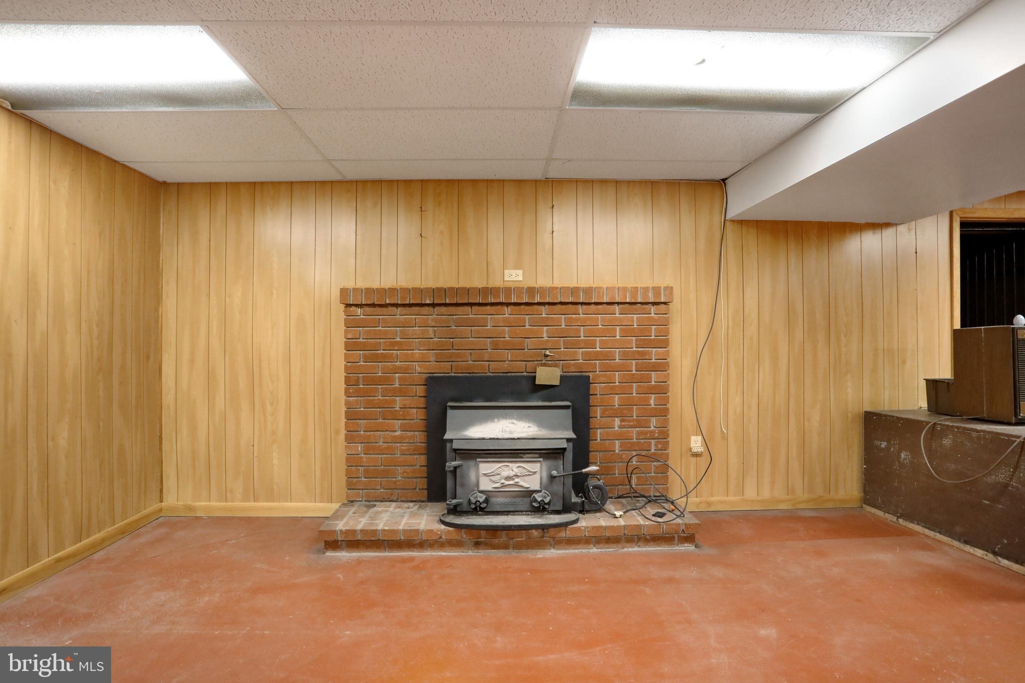 3325 Chambersburg Road Biglerville, PA 17307 - Photo 34 of 44 Woodburning stove in recreation room