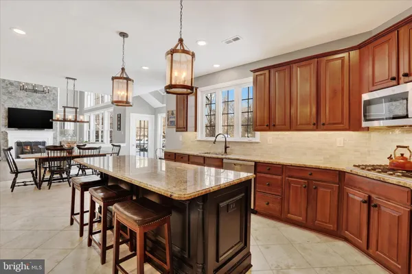 a view of a livingroom with furniture and a flat screen tv
