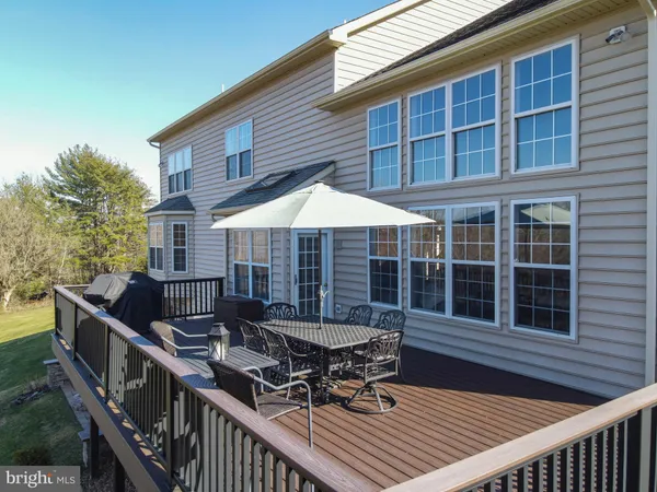 a kitchen with a sink a stove and cabinets