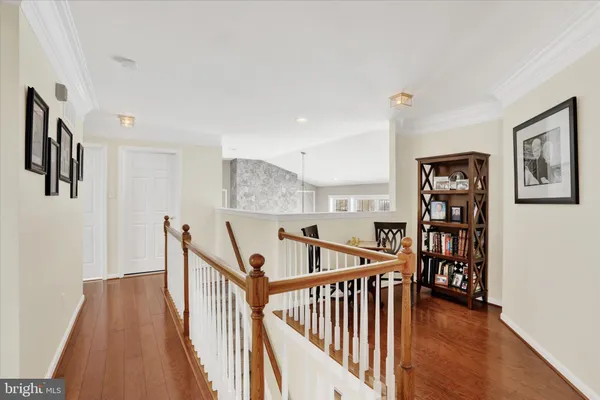a room with furniture and wooden floor