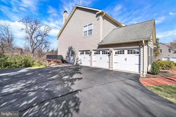 a workspace with furniture and book shelf