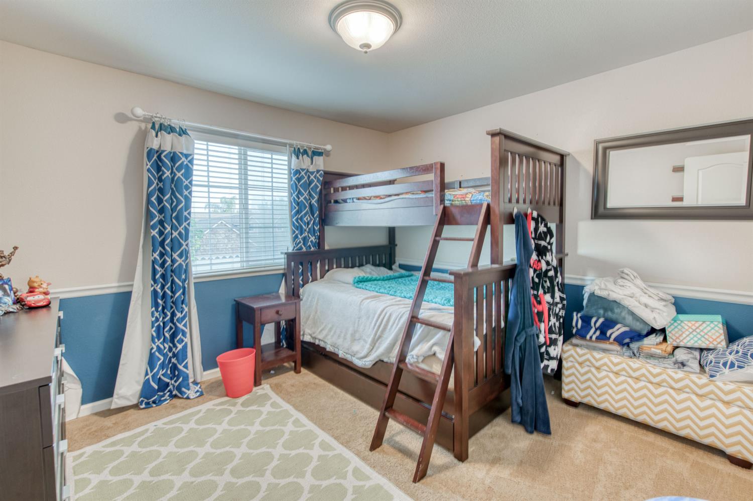 677 Everglade Avenue Clovis, CA 93619 - Photo 22 of 29 a bedroom with a bed and a window