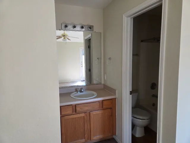 a bathroom with a sink and toilet