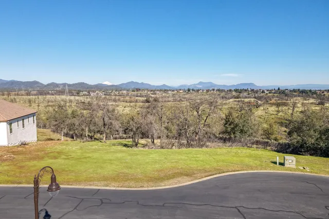 a view of a lake with a mountain in the background
