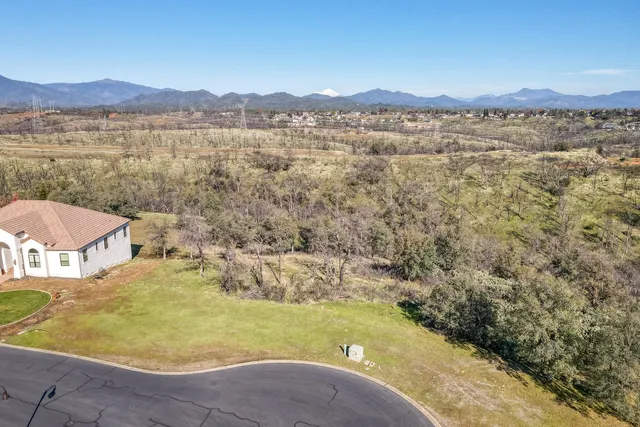 a view of a lake with a mountain in the background