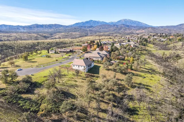 a view of a lake with mountains in the background