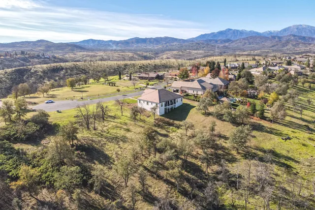 a view of a lake with mountains in the background