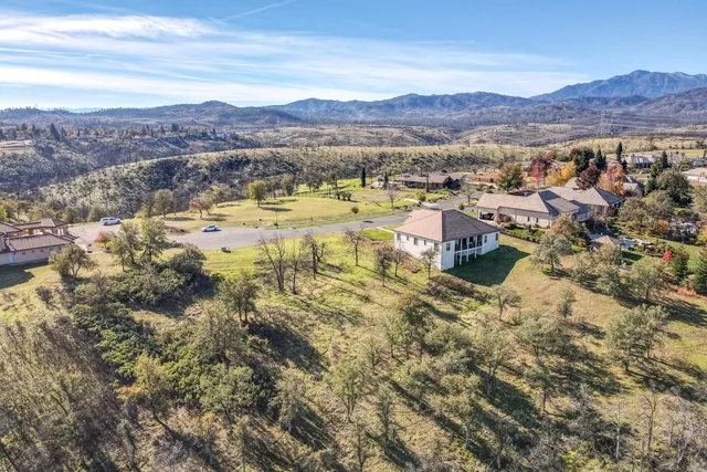 a view of a lake with mountains in the background