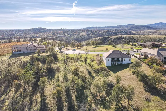 a view of a city with an ocean view