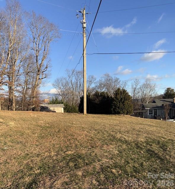 5 Loop Road Candler, NC 28715 - Photo 10 of 17 a street view with large trees