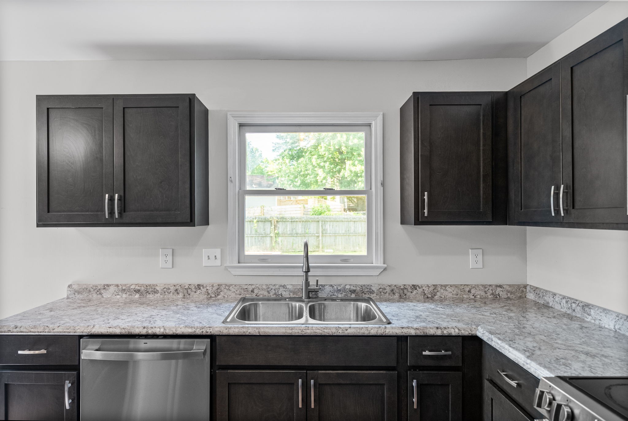1706 Hazelwood Road Clarksville, TN 37042 - Photo 12 of 31 a kitchen with granite countertop a sink and a window
