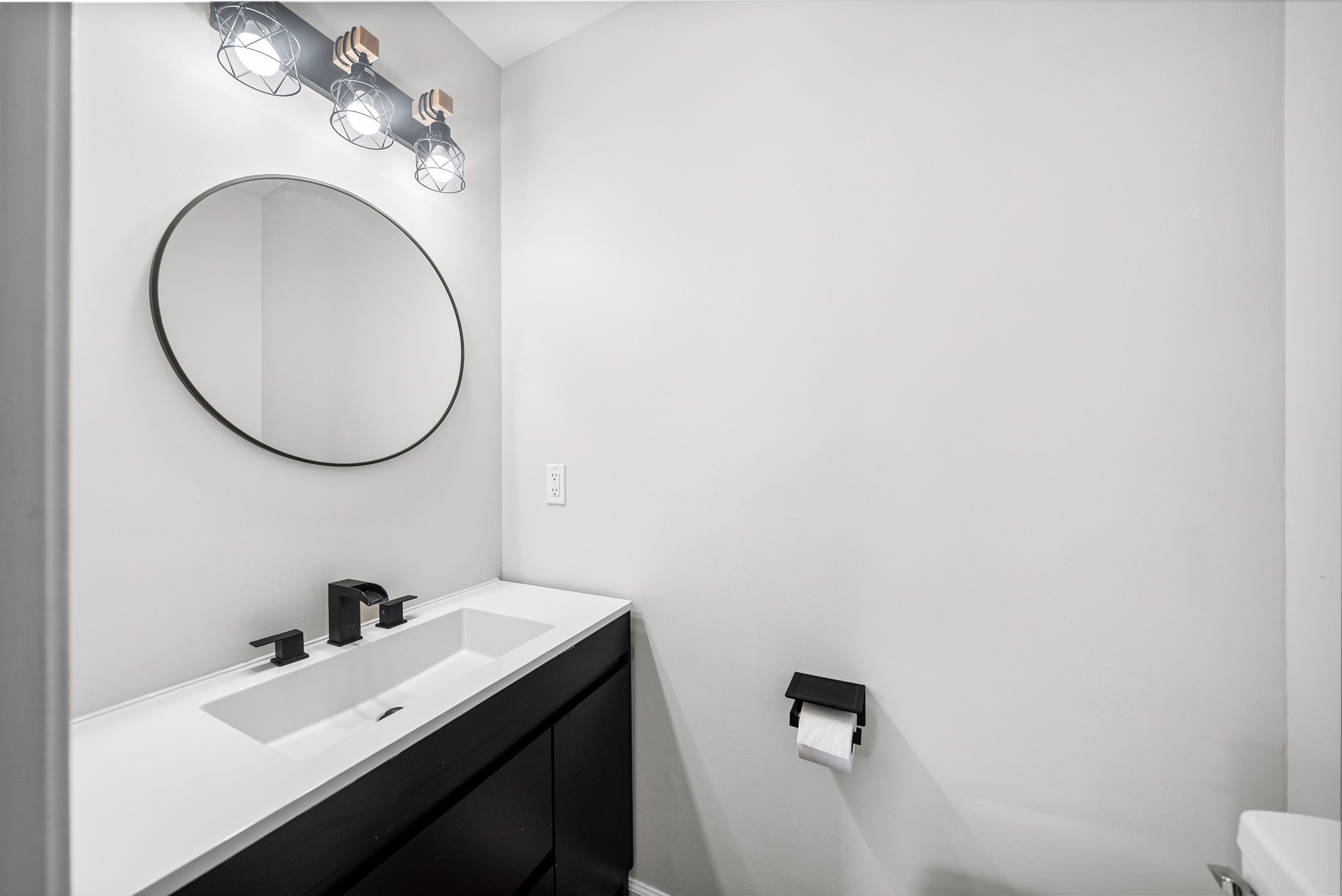 1706 Hazelwood Road Clarksville, TN 37042 - Photo 13 of 31 a bathroom with a sink and a mirror