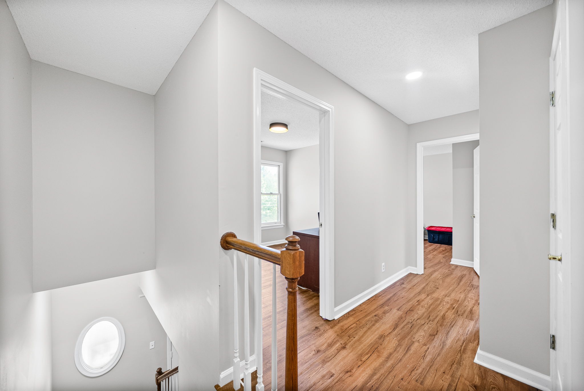 1706 Hazelwood Road Clarksville, TN 37042 - Photo 14 of 31 a view of hallway with wooden floor