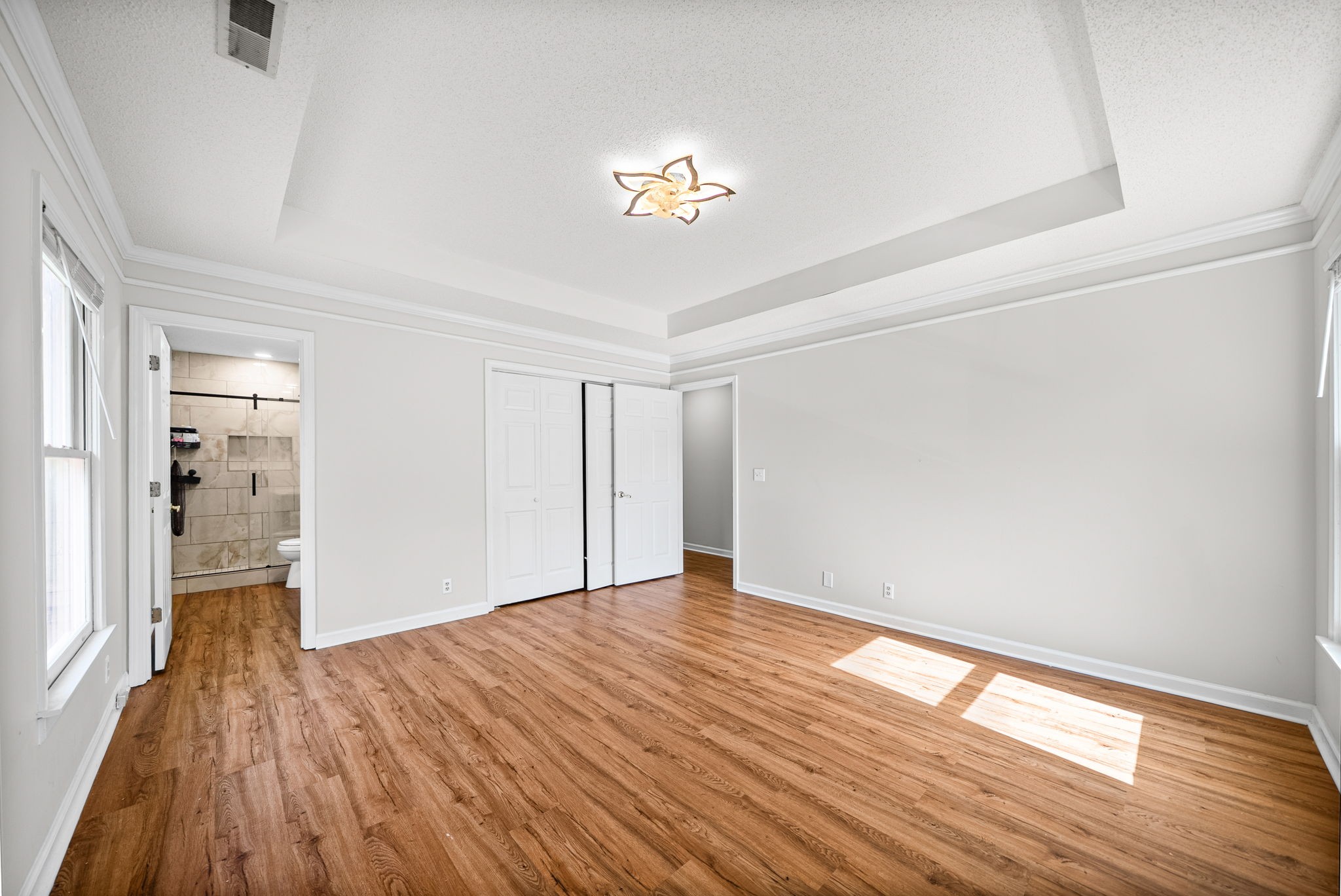 1706 Hazelwood Road Clarksville, TN 37042 - Photo 16 of 31 a view of empty room with wooden floor and fan