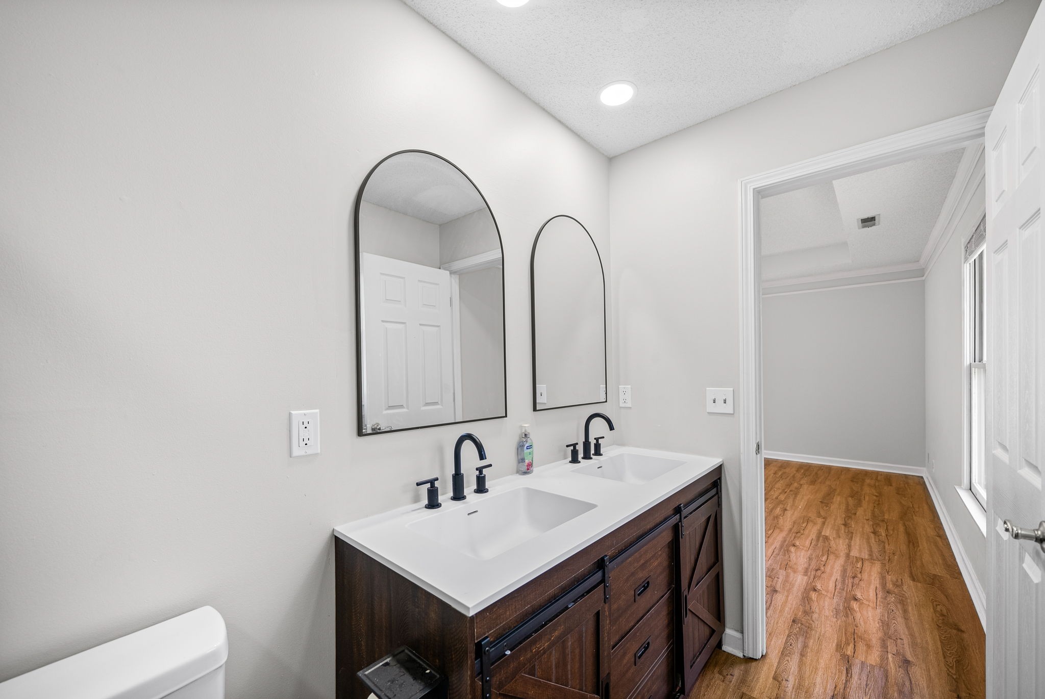 1706 Hazelwood Road Clarksville, TN 37042 - Photo 18 of 31 a bathroom with a sink and a mirror