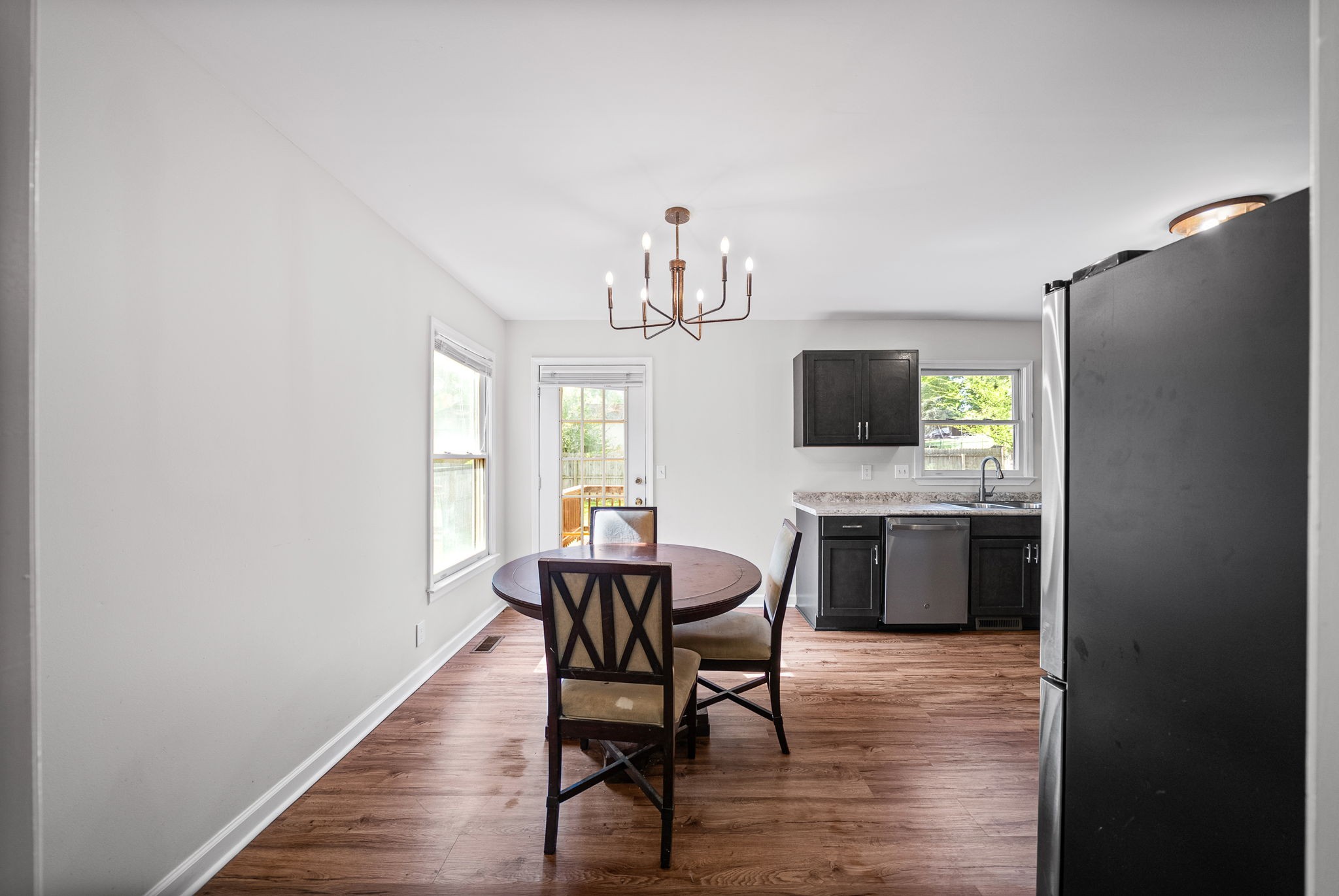 1706 Hazelwood Road Clarksville, TN 37042 - Photo 7 of 31 a view of a dining room with furniture and window