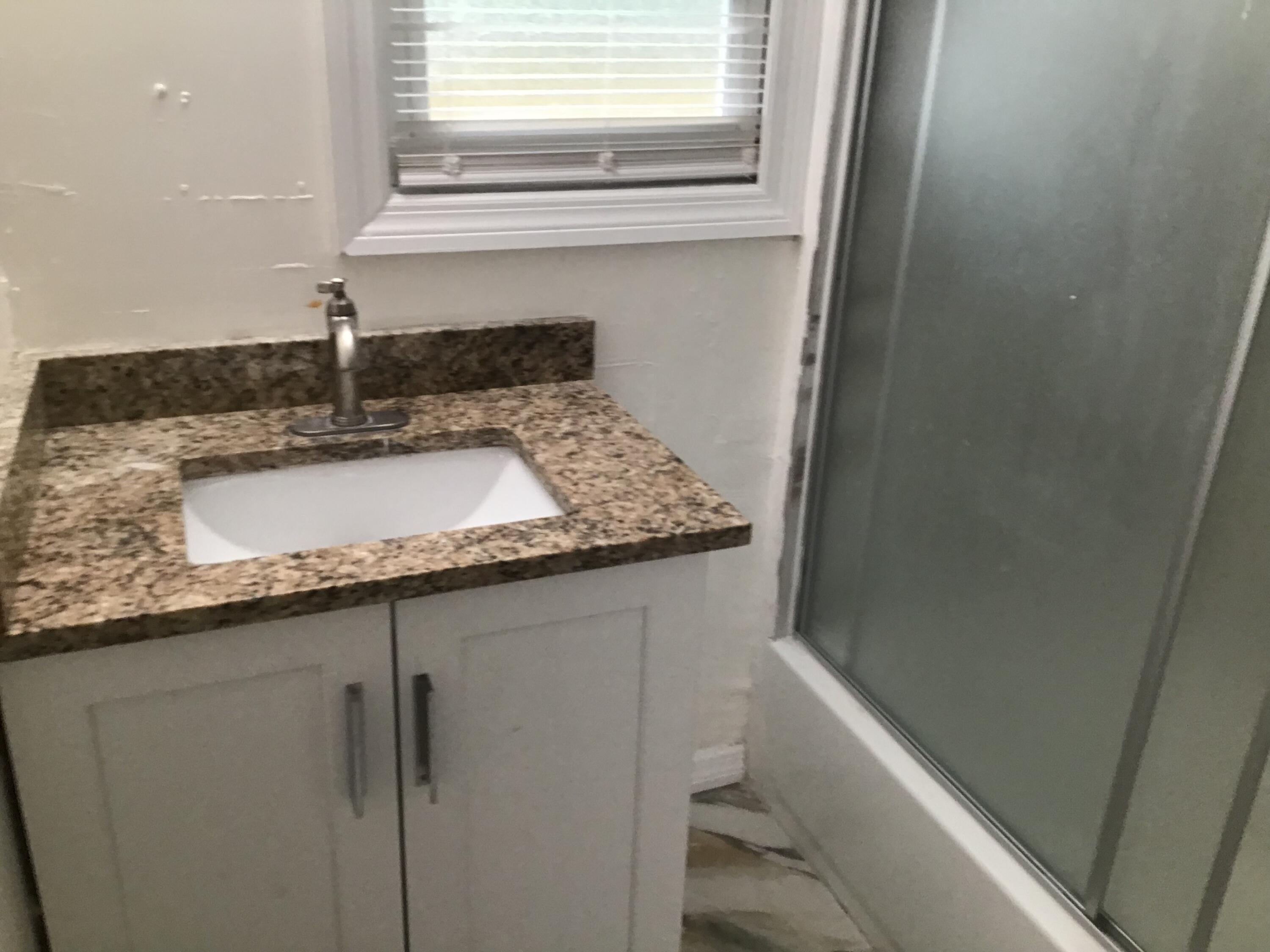 619 Southwest 10th Street Delray Beach, FL 33444 - Photo 54 of 88 B1BAC0C6-3754-4276-8639-A1C7A1C96BBB