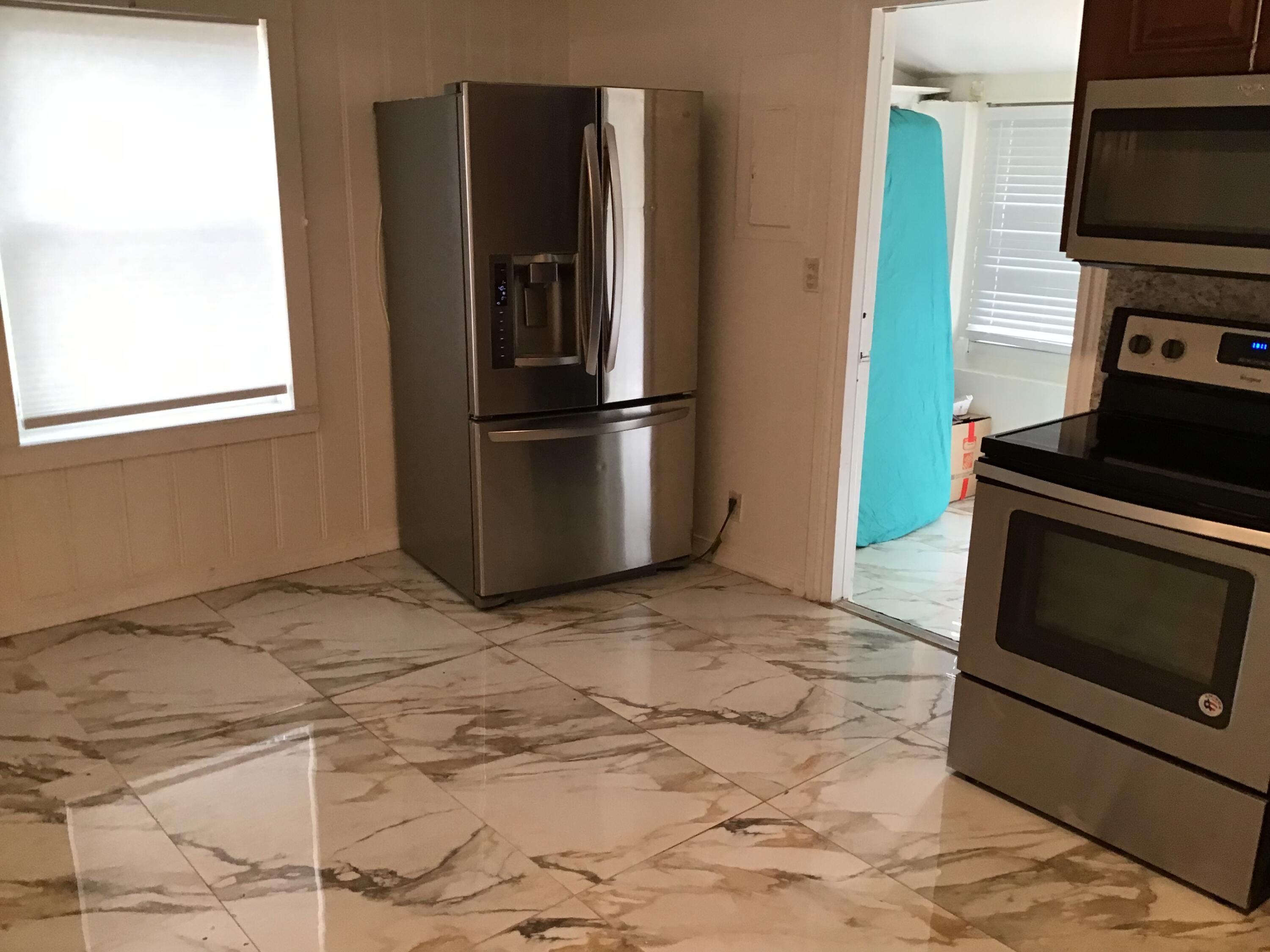 619 Southwest 10th Street Delray Beach, FL 33444 - Photo 77 of 88 5A7F1AF8-6E54-4CB6-87D9-05B47BF5BCE9