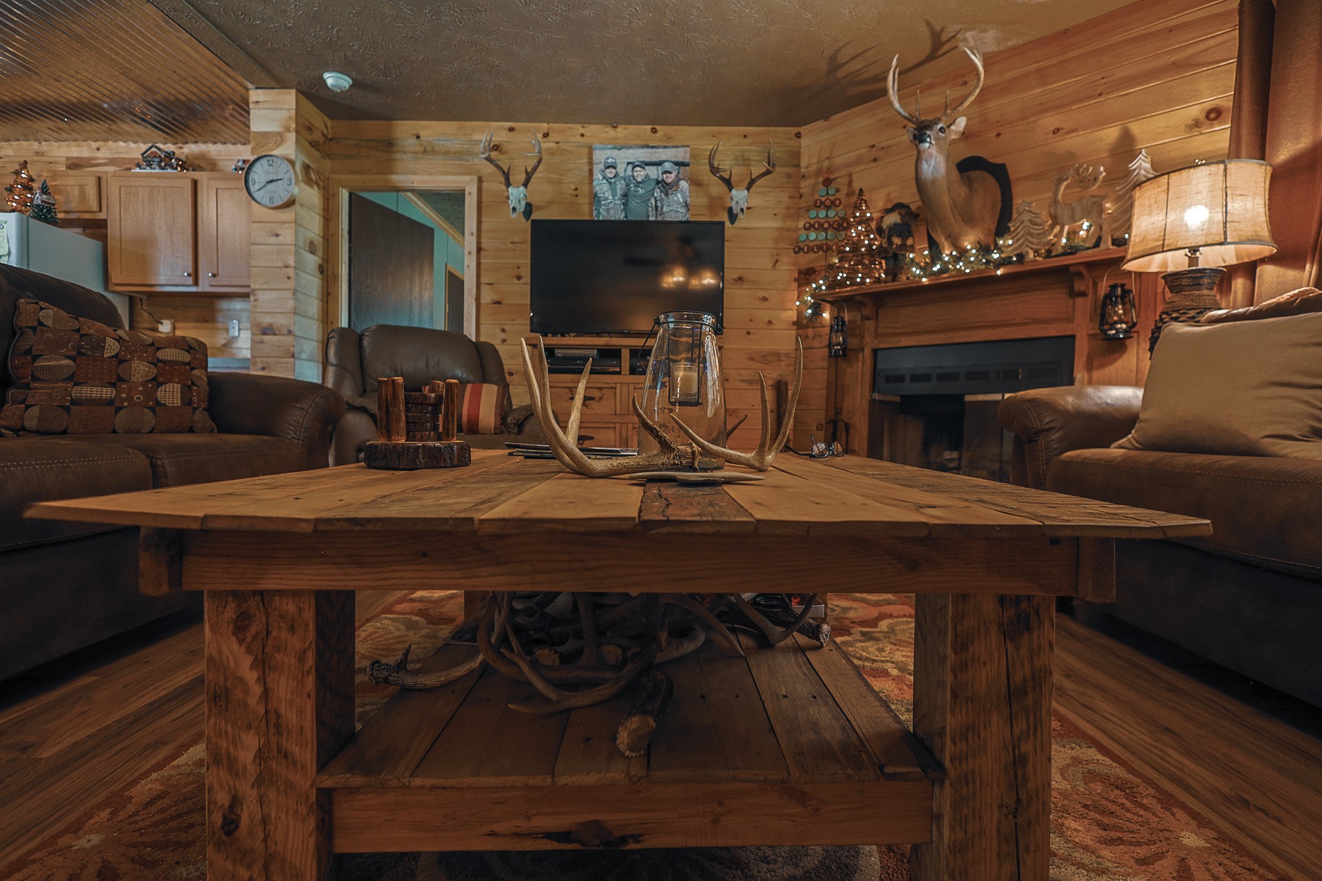 555 Lay Hollow Road Waynesboro, TN 38485 - Photo 15 of 68 a view of a dining room with furniture and a fireplace