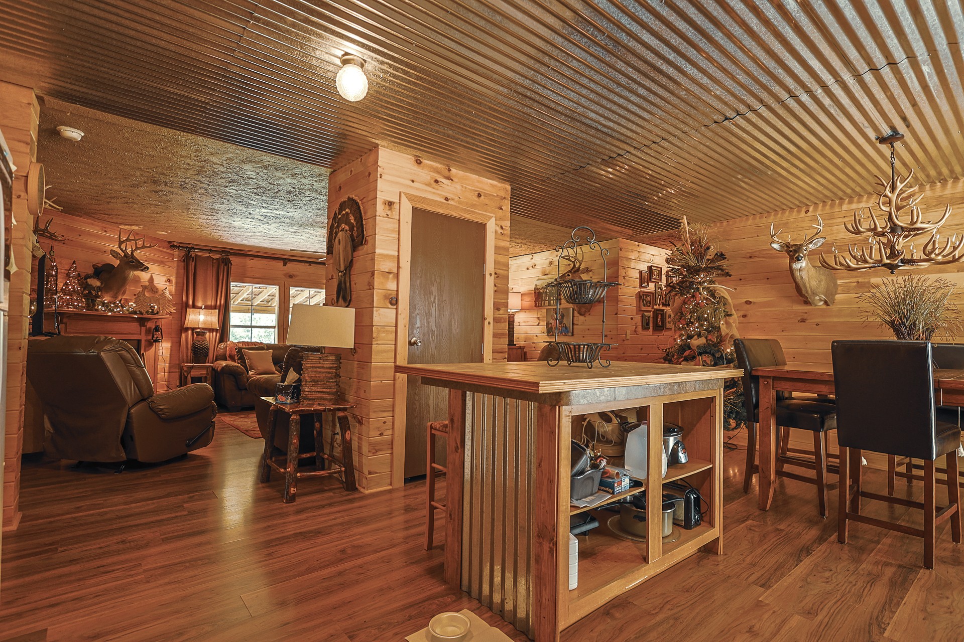 555 Lay Hollow Road Waynesboro, TN 38485 - Photo 17 of 68 a view of a dining room with furniture window and wooden floor