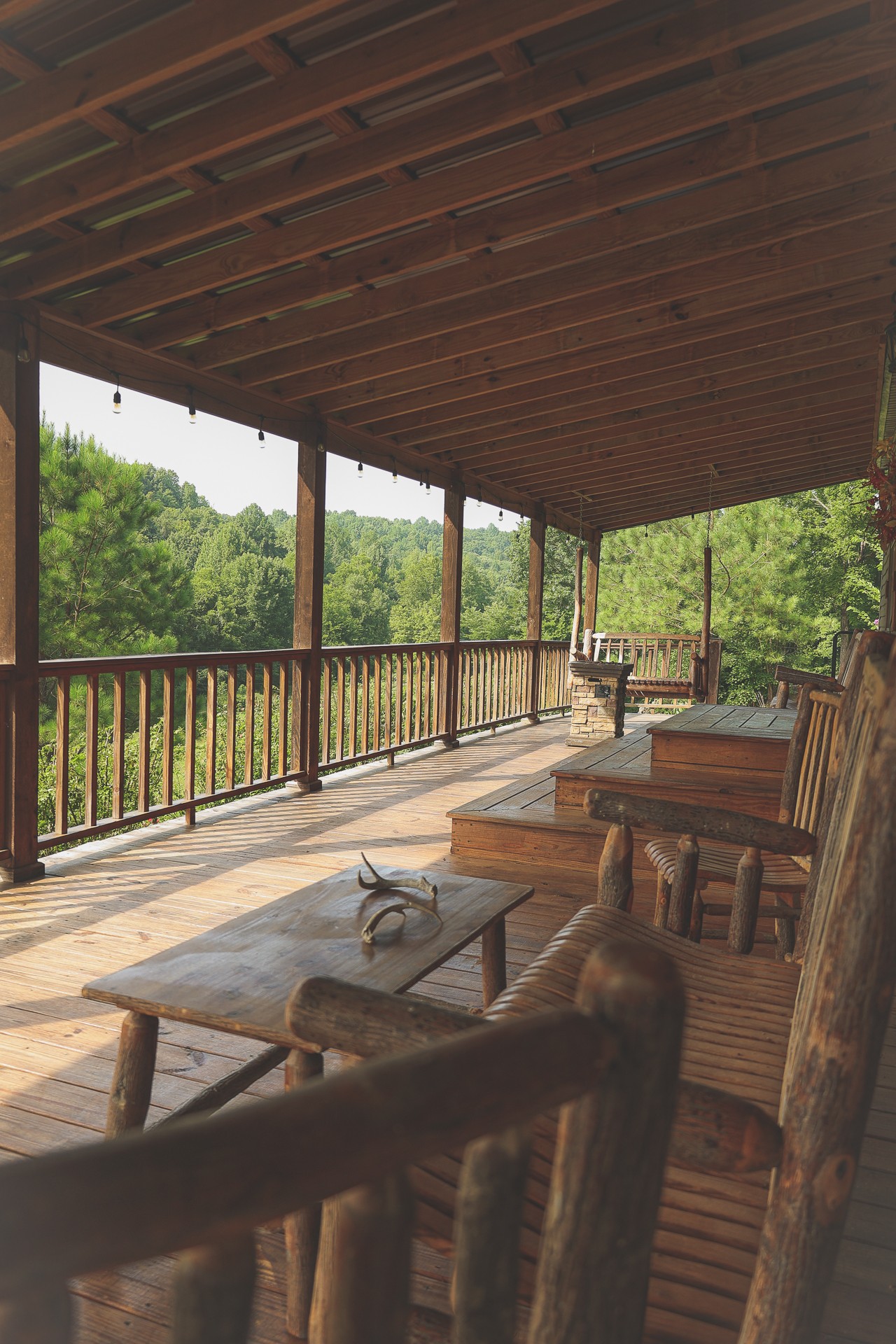 555 Lay Hollow Road Waynesboro, TN 38485 - Photo 7 of 68 a view of balcony with furniture and wooden deck