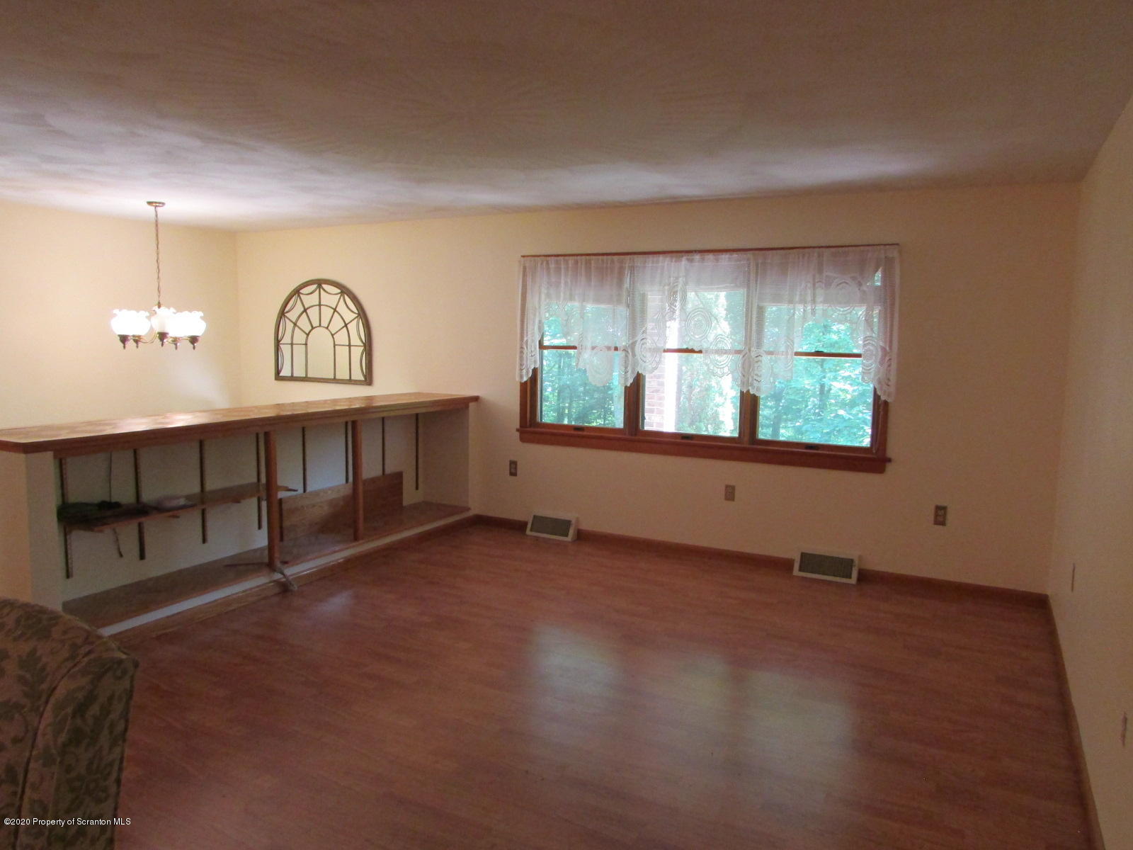 3322 North Road Montrose, PA 18801 - Photo 3 of 38 a view of a room with window and hardwood floor