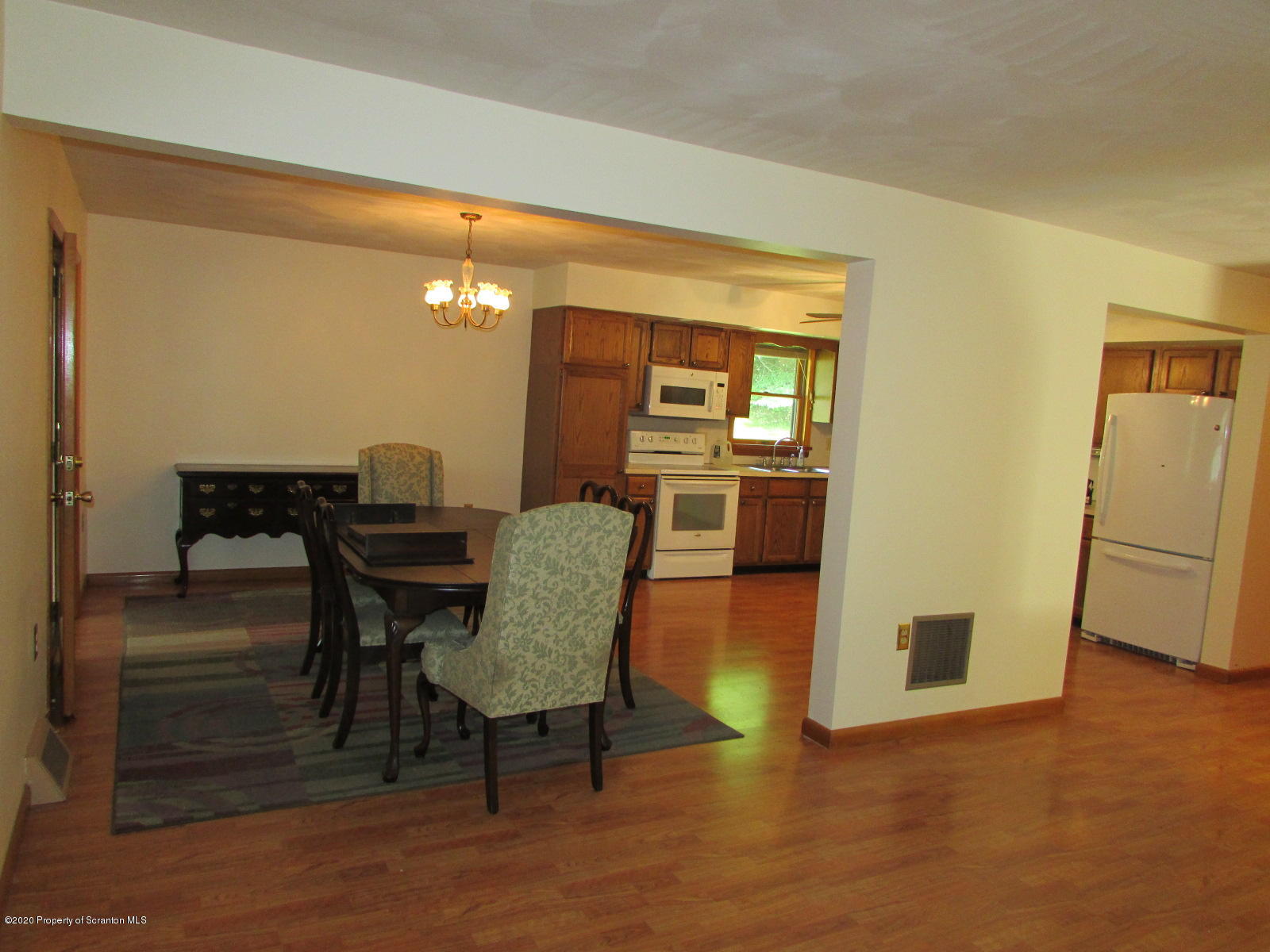 3322 North Road Montrose, PA 18801 - Photo 10 of 38 a dining room with furniture and wooden floor