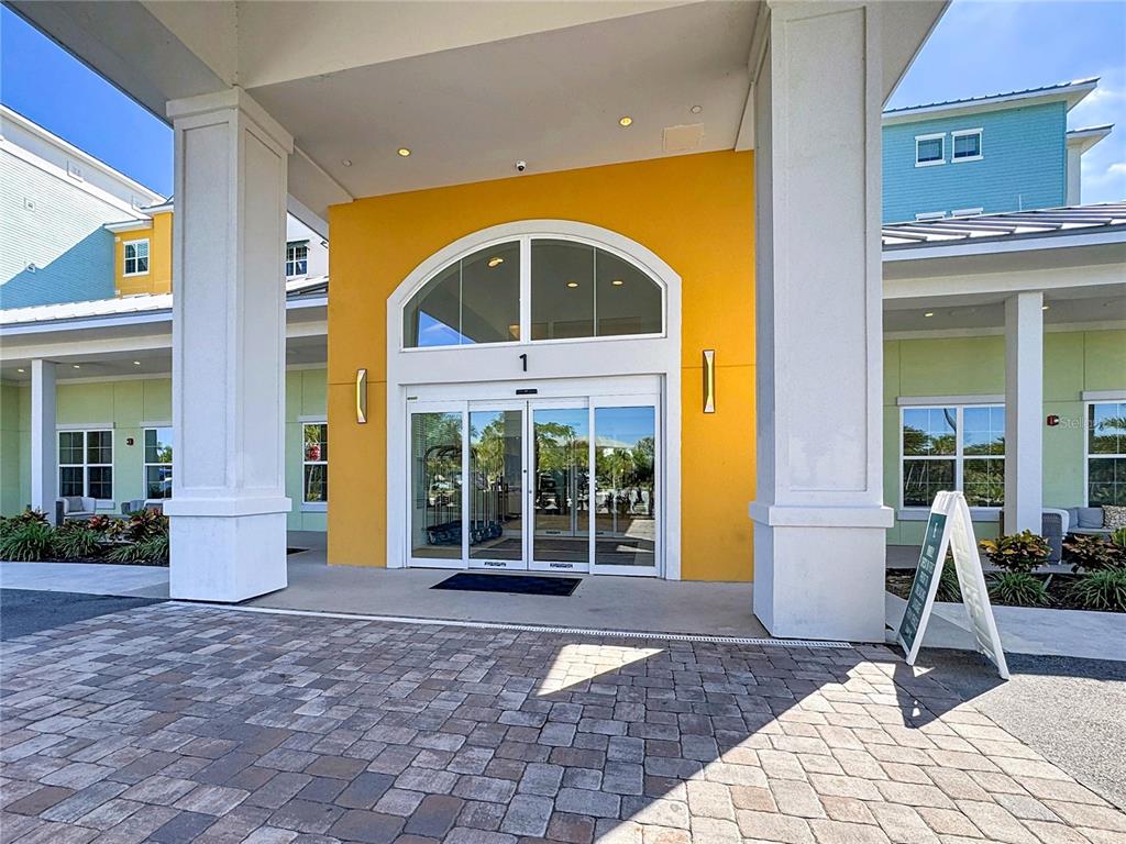 3151 Sunset Walk Drive, Unit 204 Kissimmee, FL 34747 - Photo 4 of 58 a front view of a house with a porch