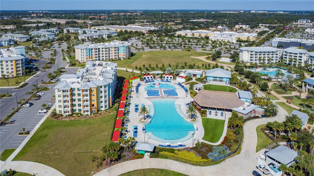 3151 Sunset Walk Drive, Unit 204 Kissimmee, FL 34747 - Photo 52 of 58 an aerial view of a house with swimming pool and ocean view