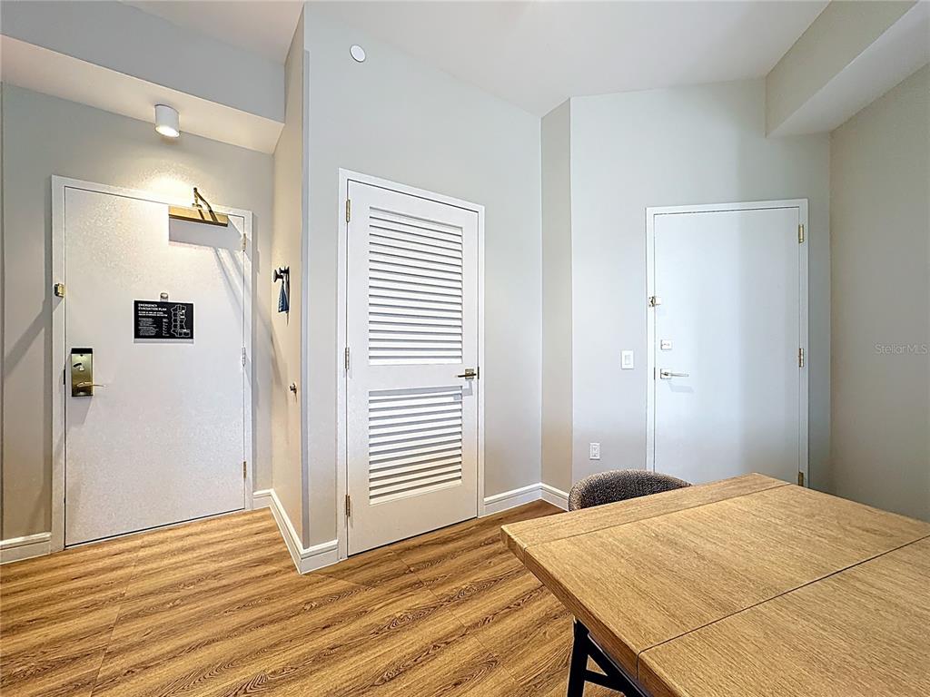 3151 Sunset Walk Drive, Unit 204 Kissimmee, FL 34747 - Photo 7 of 58 a view of a room with wooden floor and a window