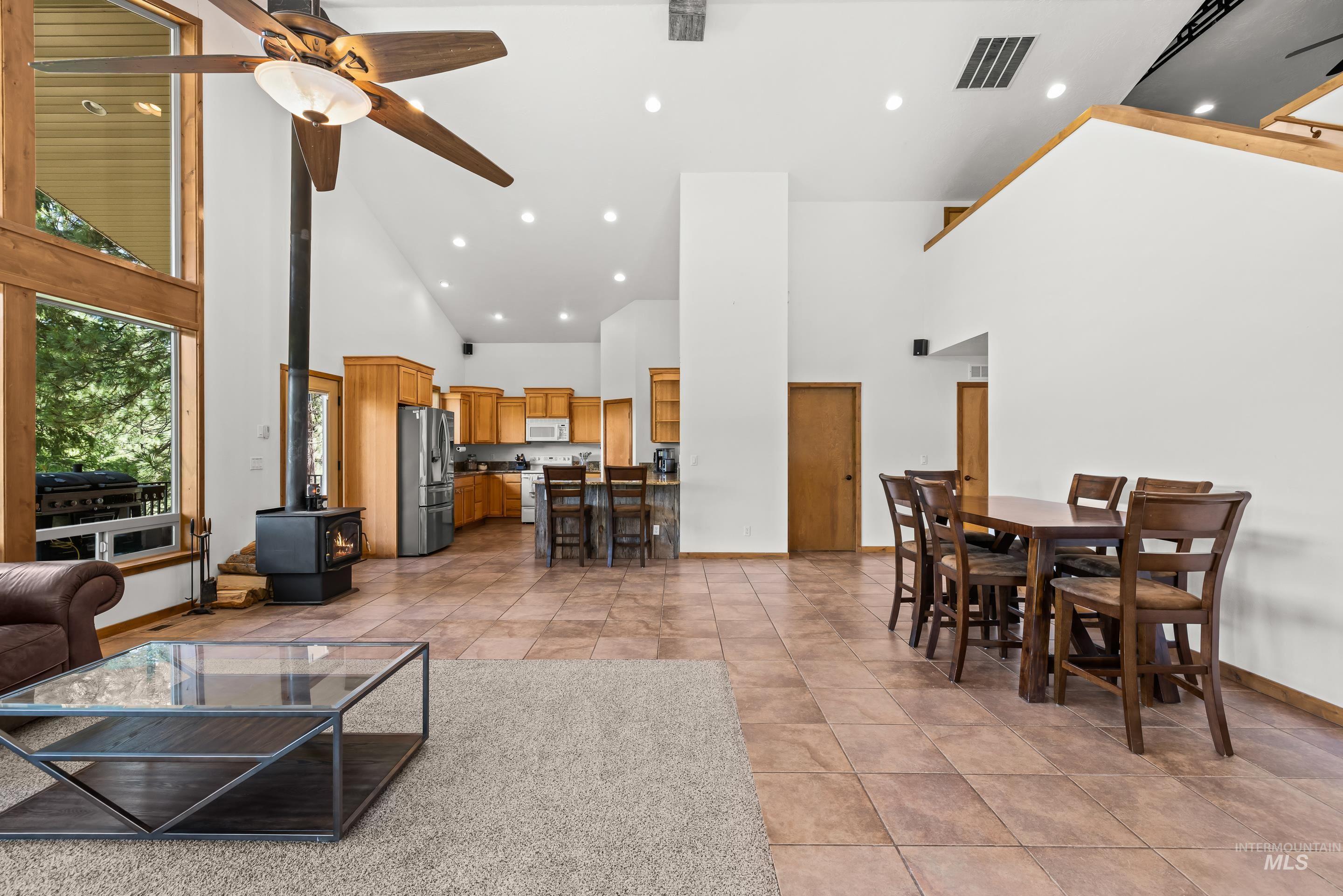 92 Cruickshank Road Horseshoe Bend, ID 83629 - Photo 5 of 50 Vaulted ceilings with recessed lighting, exposed wood beams, and a ceiling fan