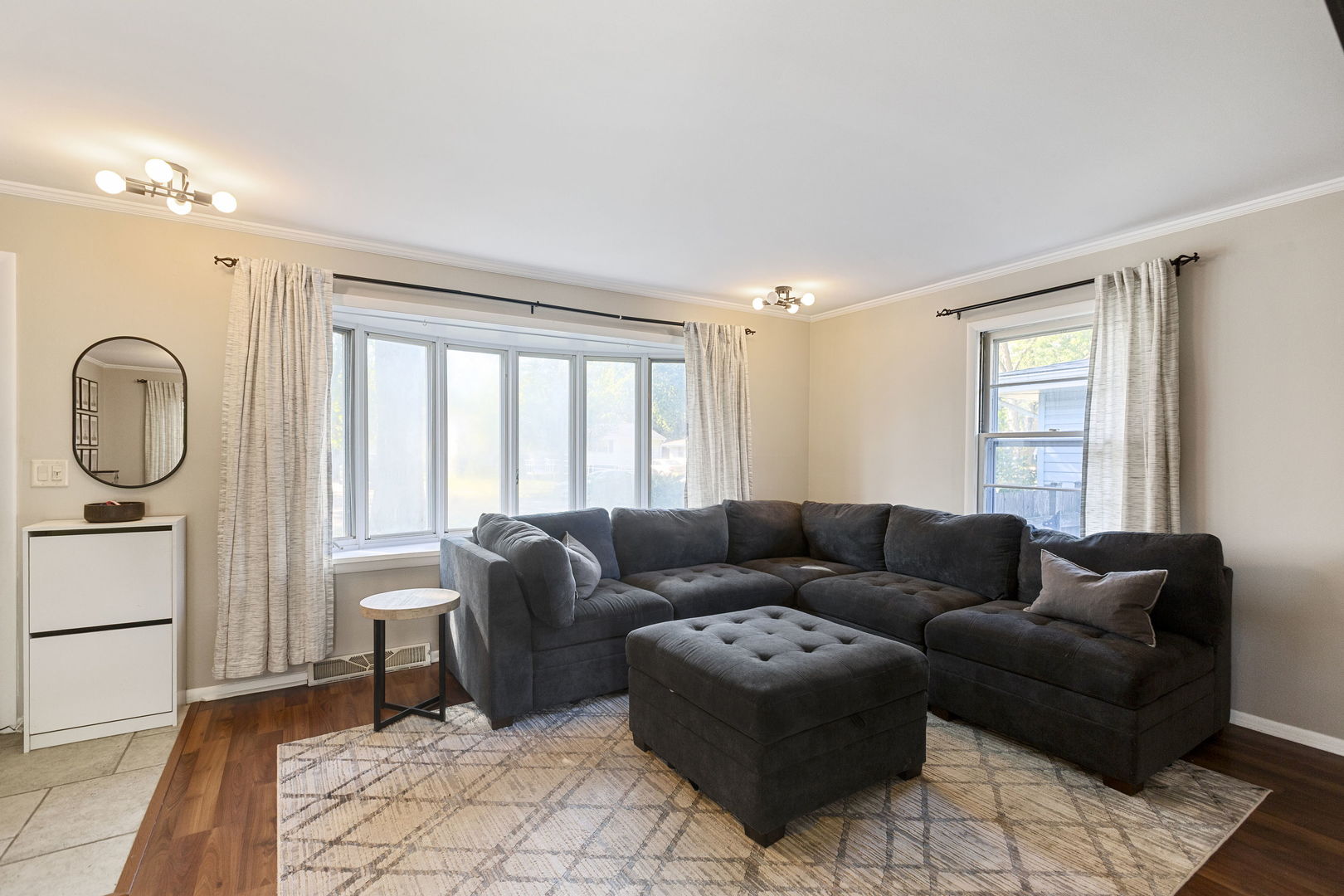 324 Alma Terrace Cary, IL 60013 - Photo 11 of 31 a living room with furniture and a window