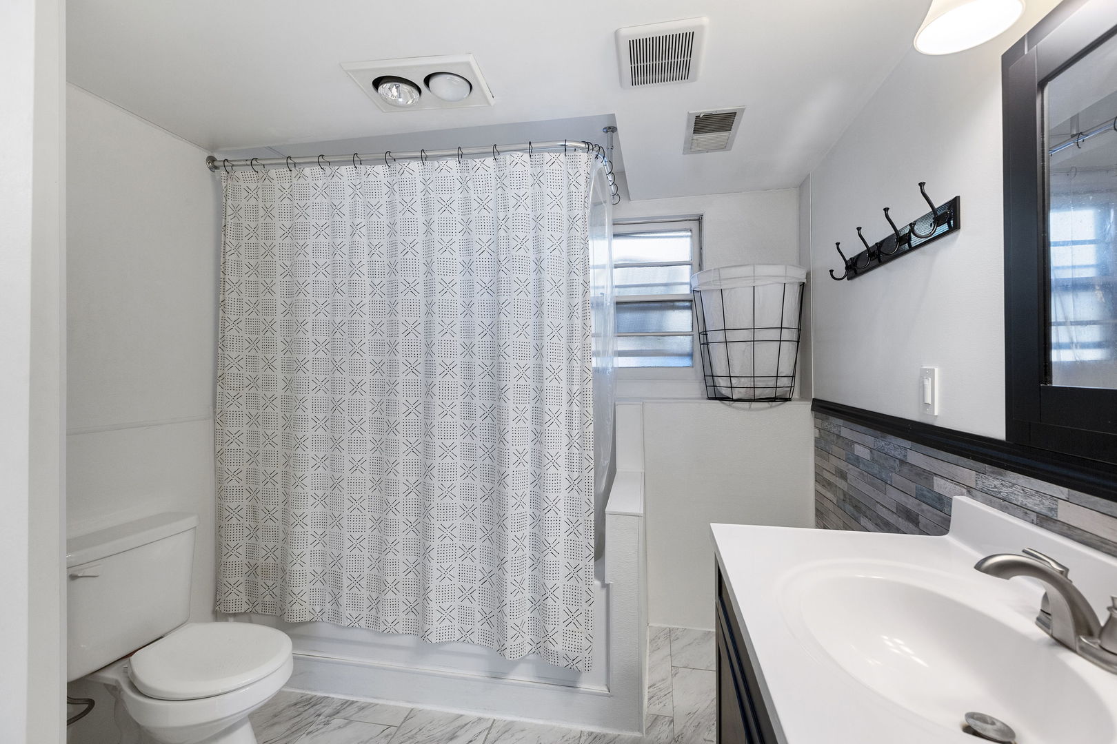 324 Alma Terrace Cary, IL 60013 - Photo 23 of 31 a bathroom with a sink a toilet a mirror and shower